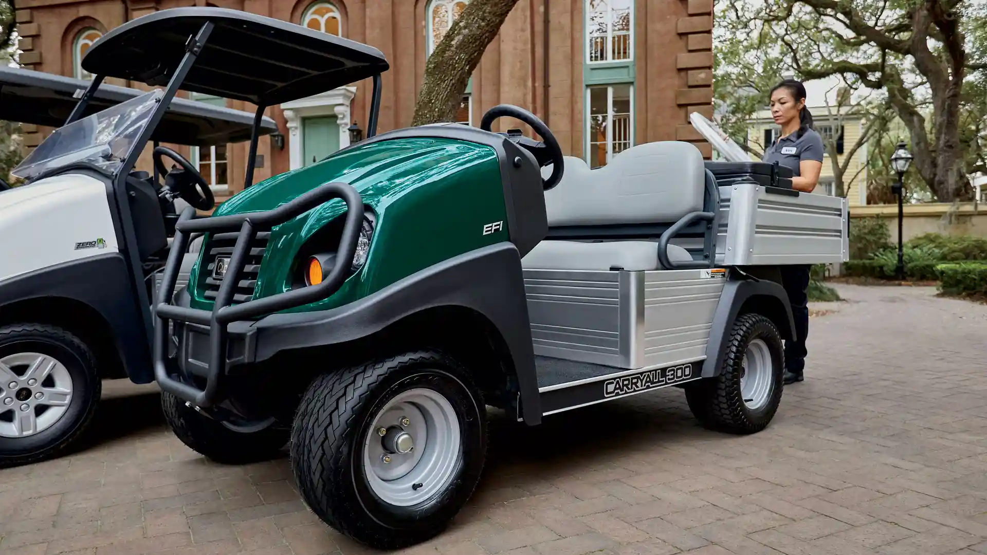 A woman loads up a Carryall 300 on a college campus.