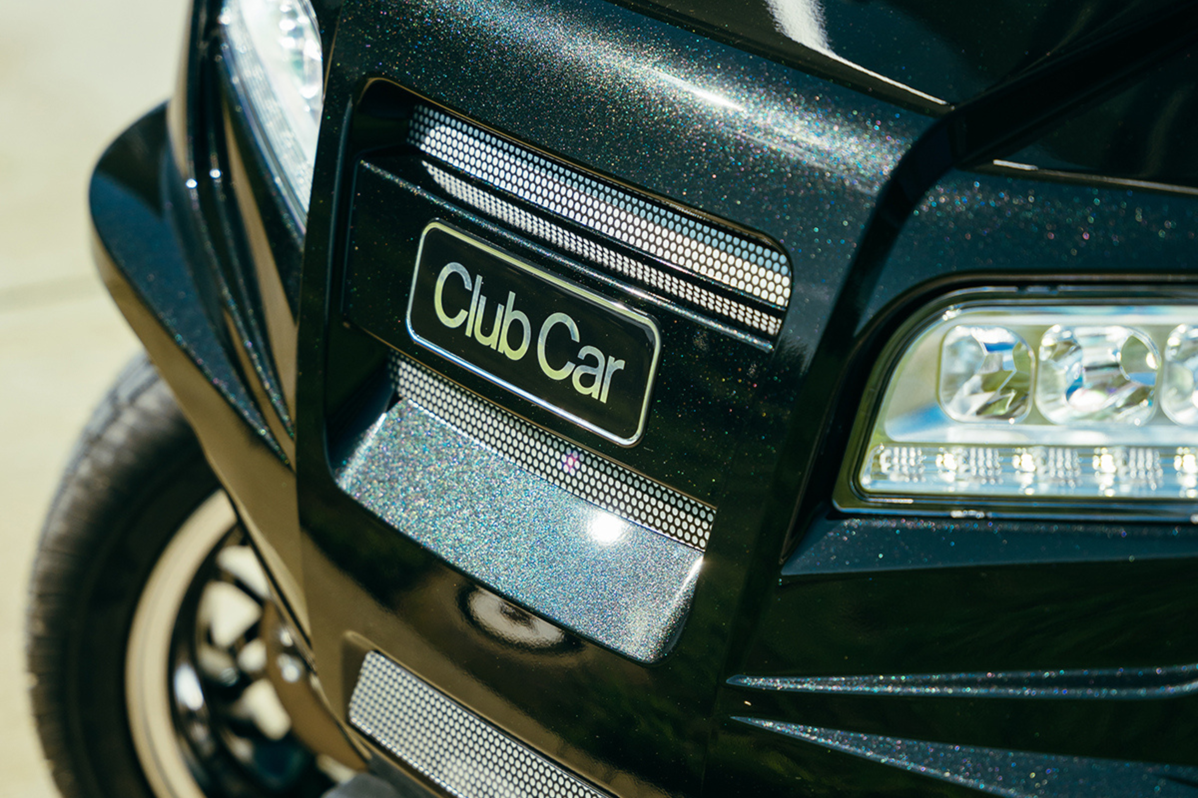 Tight shot of the front of a Club Car golf car