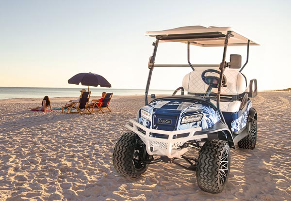 Custom golf cart with special edition features at the beach