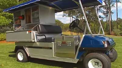 The Club Car Cafe Express sits on a golf course.
