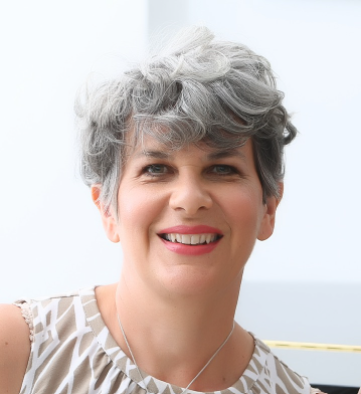 Profile picture of a woman wearing white