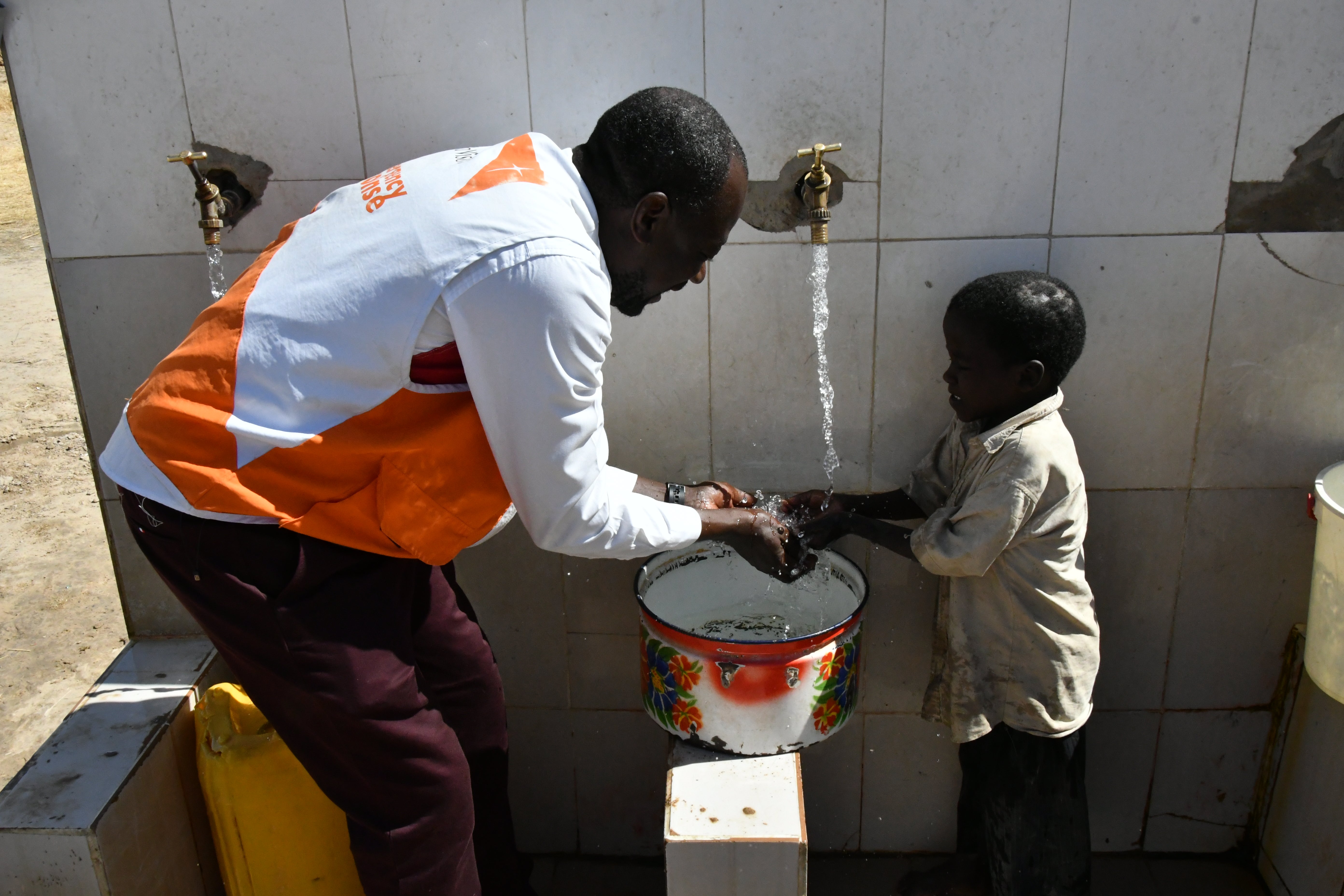 Displaced by ongoing climate disasters and living in a new camp, this WASH initiative means children enjoy clean drinking water and are no longer sick with diarrhoea 