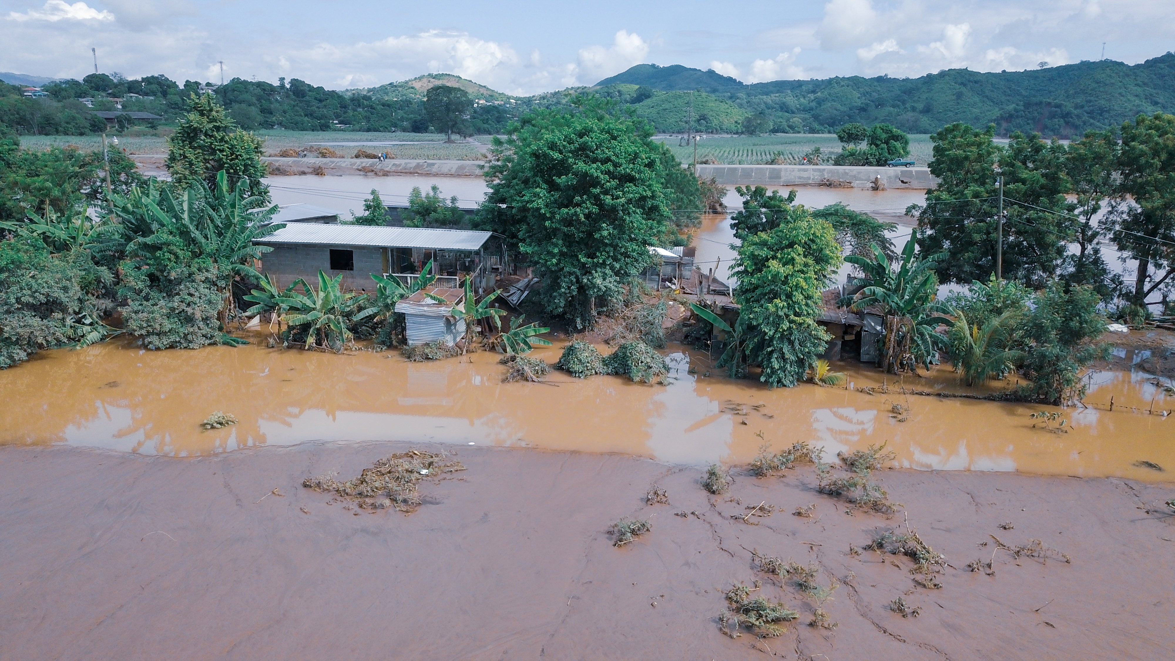 Floods broke river banks and destroyed homes