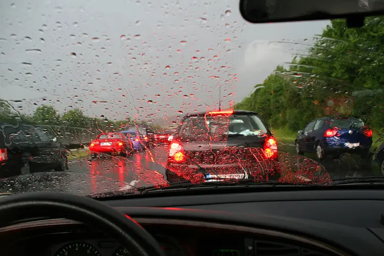 Traffic jam on the rainy day. If There Is a Car Accident During a Hurricane, Who's Responsible?
