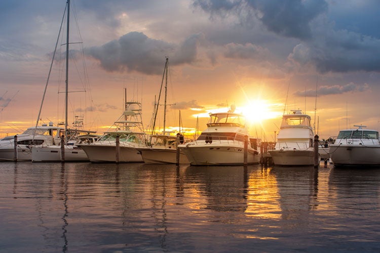 Miami marina at sunset. The most expensive boats to insure in a Florida marina.