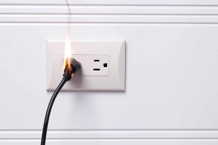 Electric plug on fire. If There's an Electric Fire in Your New House, Who's Responsible?