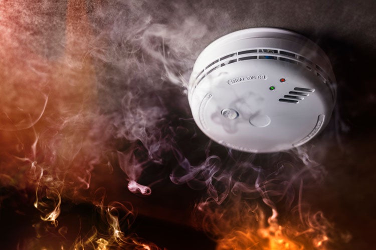 Smoke detector and fire alarm in action. If There's an Electric Fire in Your New House, Who's Responsible?