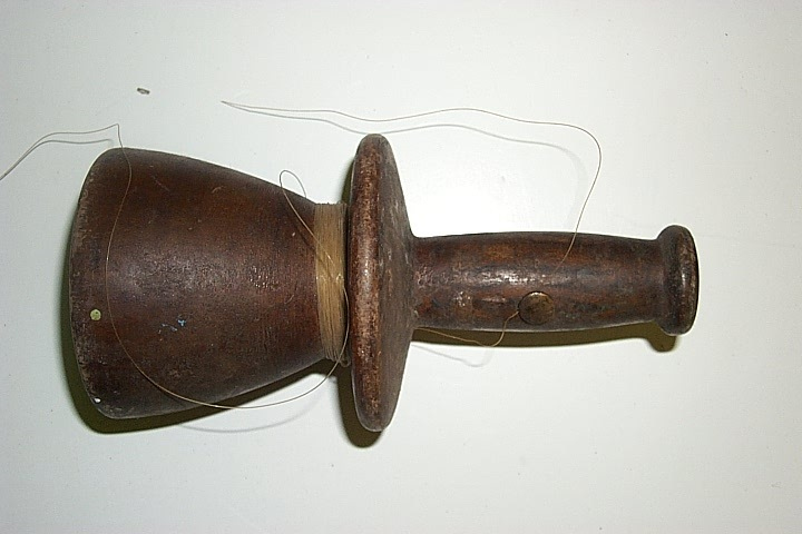 Fishing Reel. This solid wooden hand fishing reel was crafted by Bill Ferris for his father Jack Ferris.