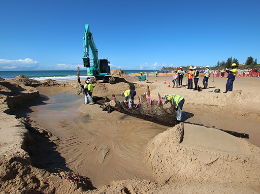 Archaeological Excavation, Thursday 30 July 2015. Decades of storms, cyclones, pounding waves, and time itself, gradually reduced the once mighty iron steamer to a remnant of its former self. The wreck was critically weakened by ex-tropical cyclone Oswald in 2013. A long term management strategy was developed to preserve the SS Dicky. Sunshine Coast Council removed the exposed elements of the wreck. Courtesy Department of Environment and Heritage Protection.