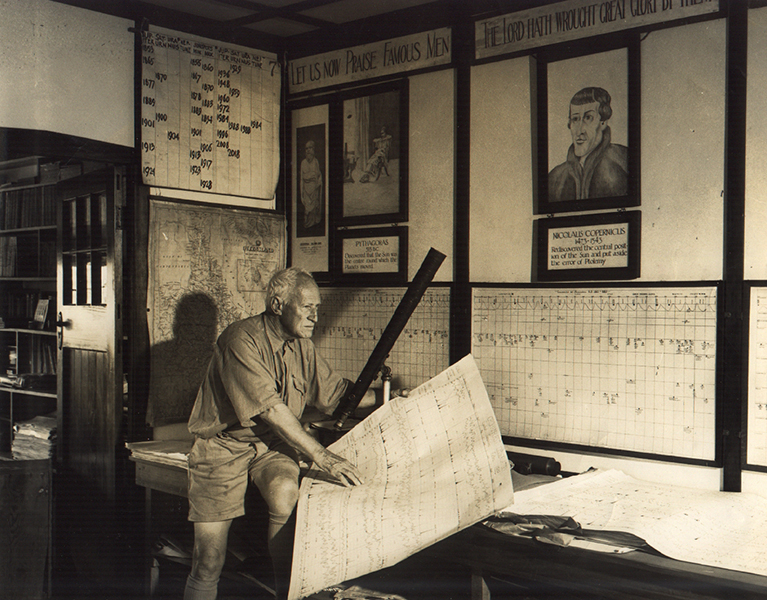 Inigo inside the Crohamhurst Observatory using charts for his work – Peachester History Committee Inc.