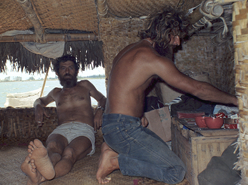 La Balsa crew members relaxing in the raft cabin while the raft was under tow to Brisbane, November 11, 1970.