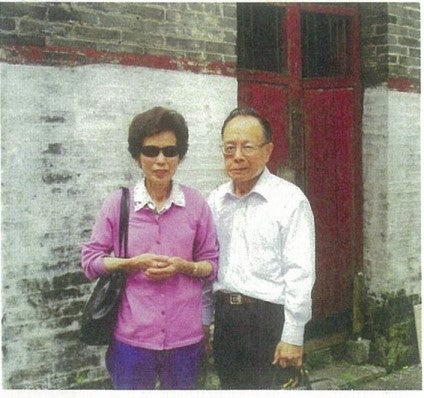 King Fong and Kathy Leong in front of the ancestral home in Duntao (2010)