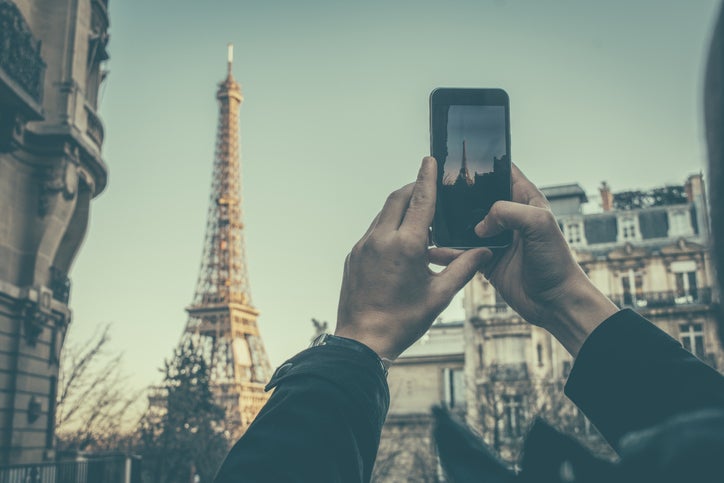 taking photo of eiffel tower