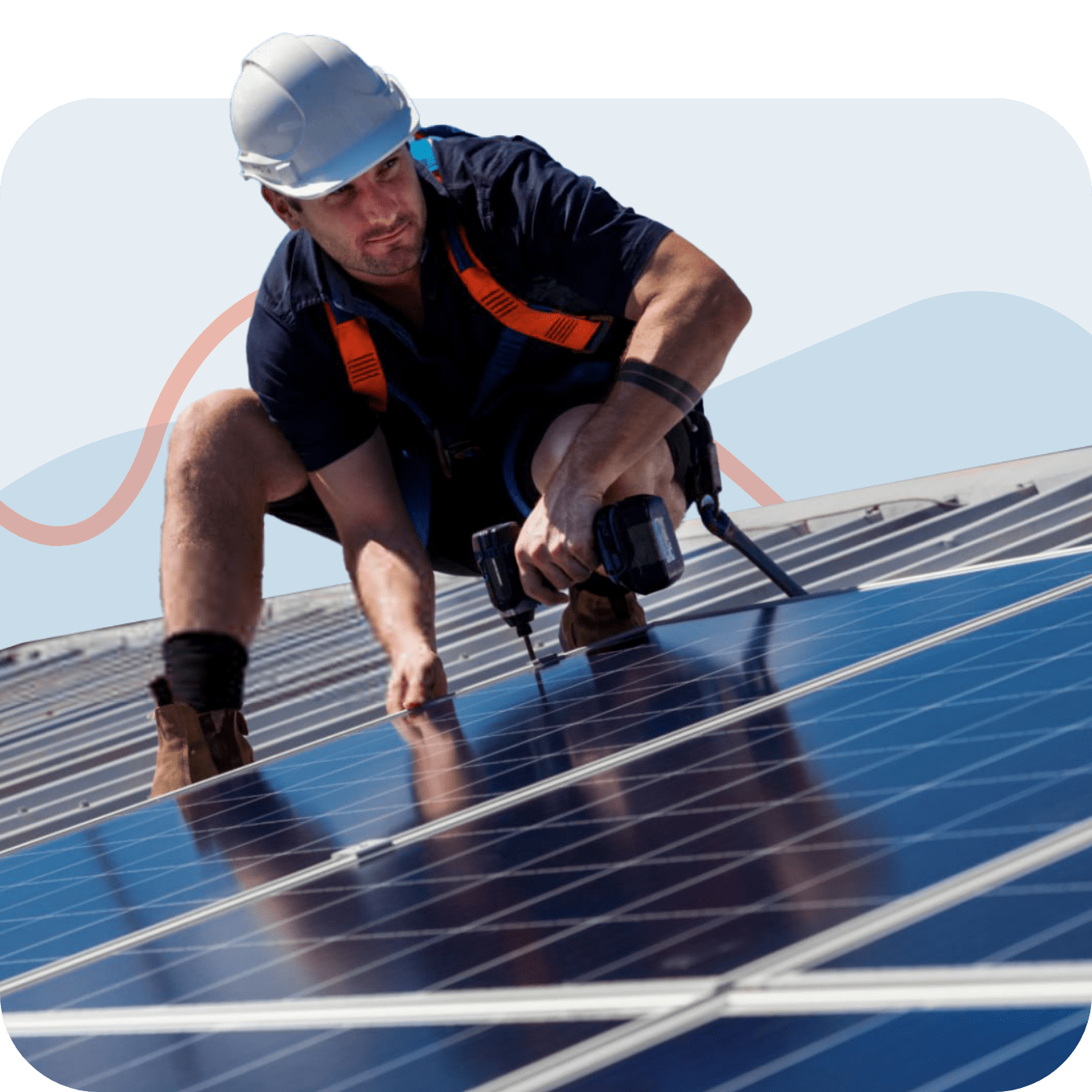 Technician installing solar panels on a roof