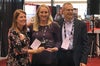 Nicole Cammarata and Darin Zehr receiving FPSA 2019 innovation showcase award.