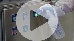 Sanitize and cover controls before wet cleaning to prevent contamination afterwards