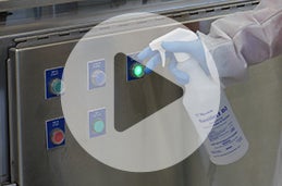 Sanitize and cover controls before wet cleaning to prevent contamination afterwards