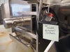 A note on an equipment handle calling out food safety risks related to hygienic design. 