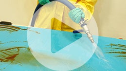 Reduced water pressure and correct positioning are important to control overspray and avoid cross contamination.