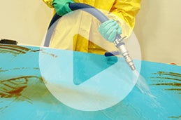 Reduced water pressure and correct positioning are important to control overspray and avoid cross contamination.
