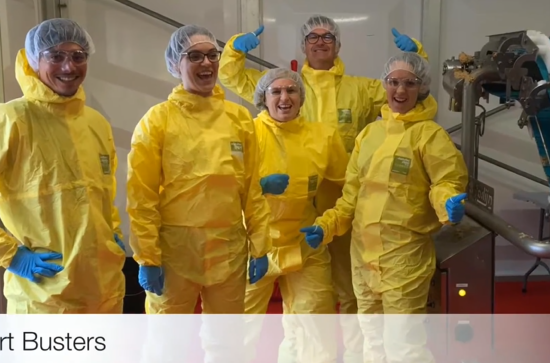 People in yellow PPE at a CFS Sanitation Essentials Training in Amsterdam in September 2019.