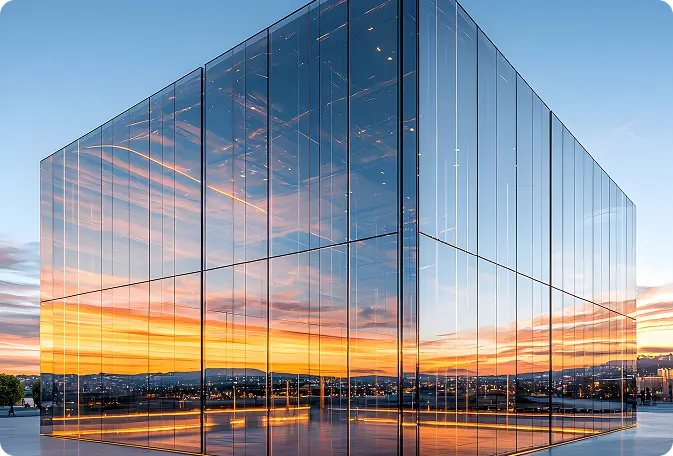 photo-modern-glass-building-city-reflecting-sunset-hues-urban-tranquilit.webp