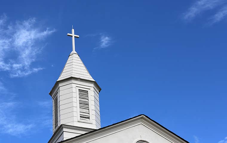 a steeple on an old church