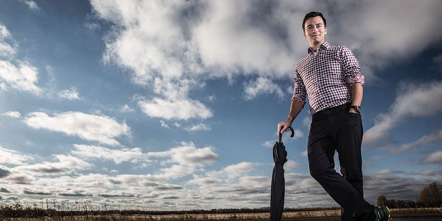 A man holding an umbrella