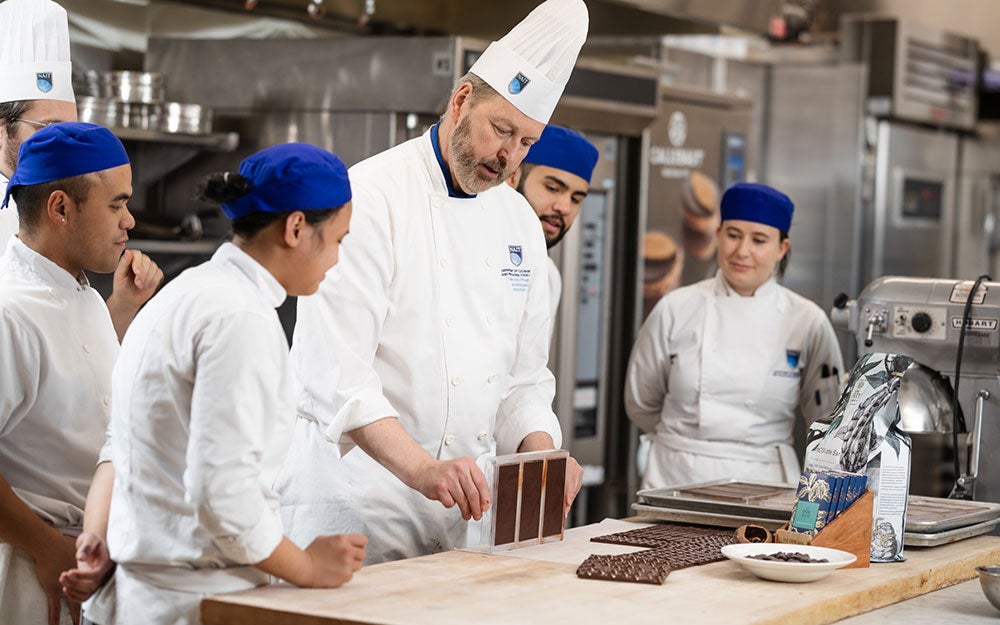 A group of chefs in a kitchen