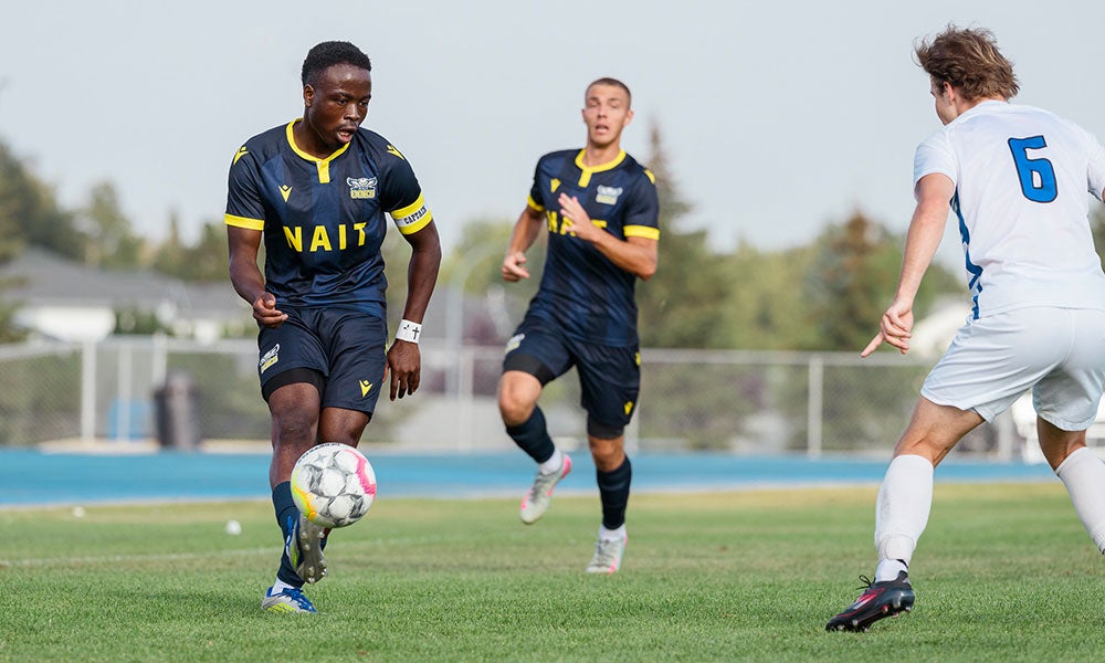 A group of men playing football