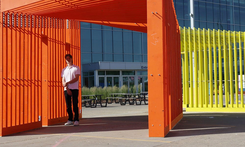 A man standing in a structure