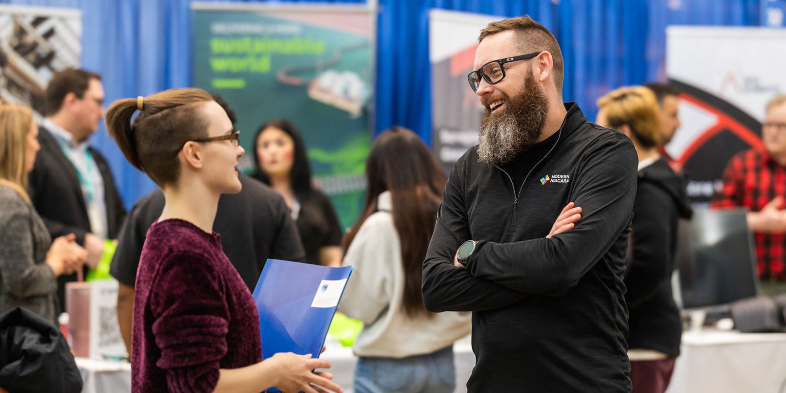 A man with a beard and glasses smiling A man with a beard and glasses smiling