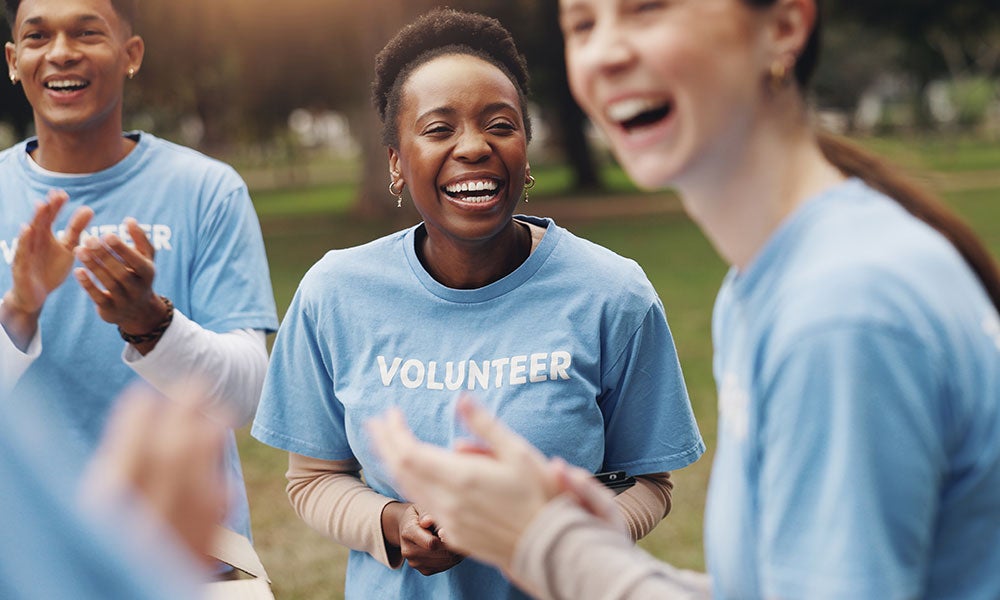 A group of people in blue t-shirts