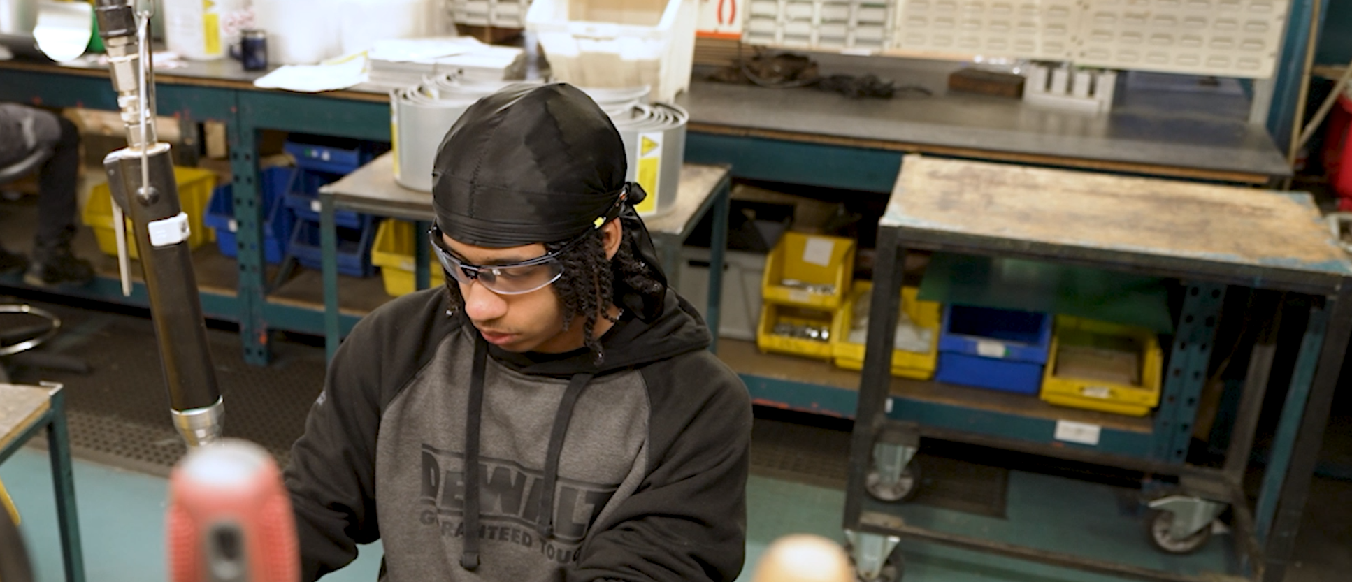 T Level student working in factory