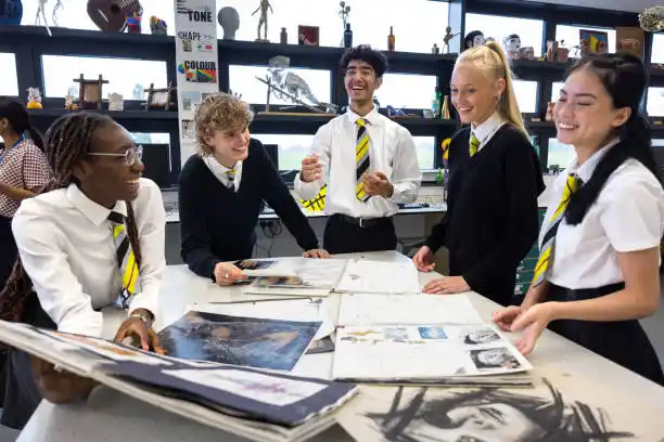 A group of young people studying at school