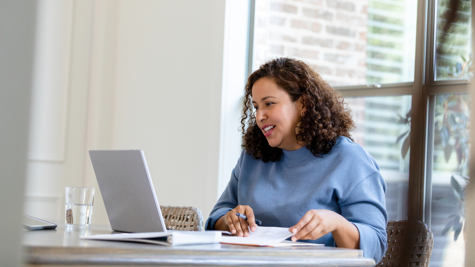 Strategise to Thrive - Learner on laptop