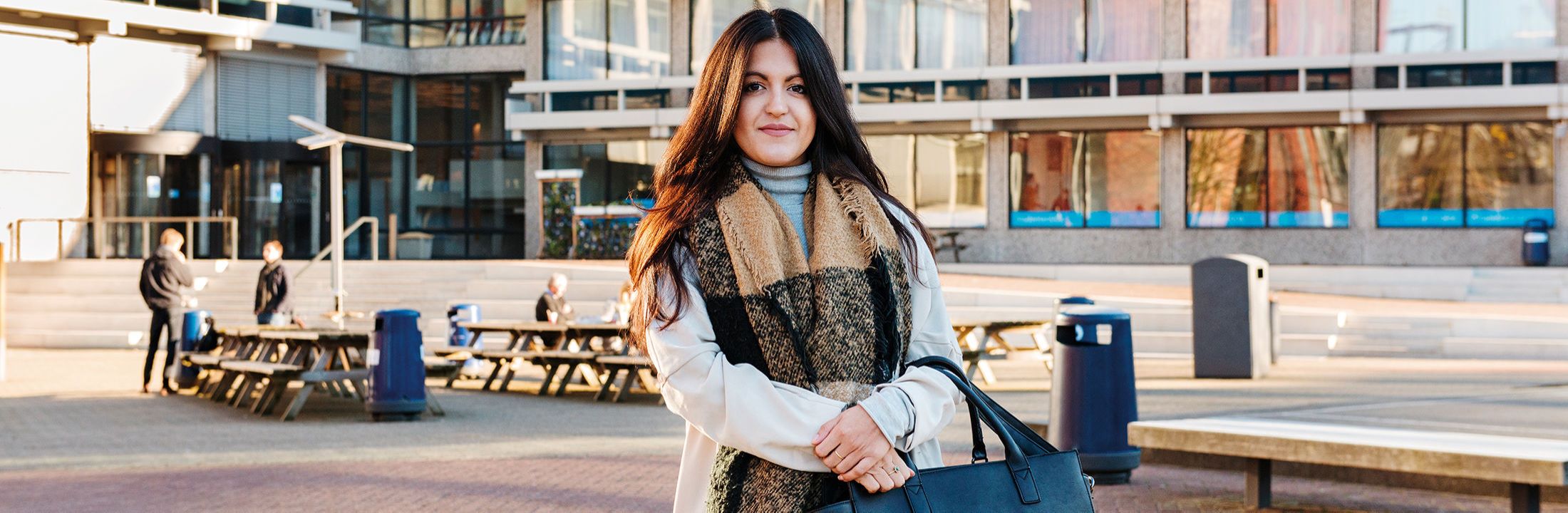 Student girl standing on the VU Campus square 