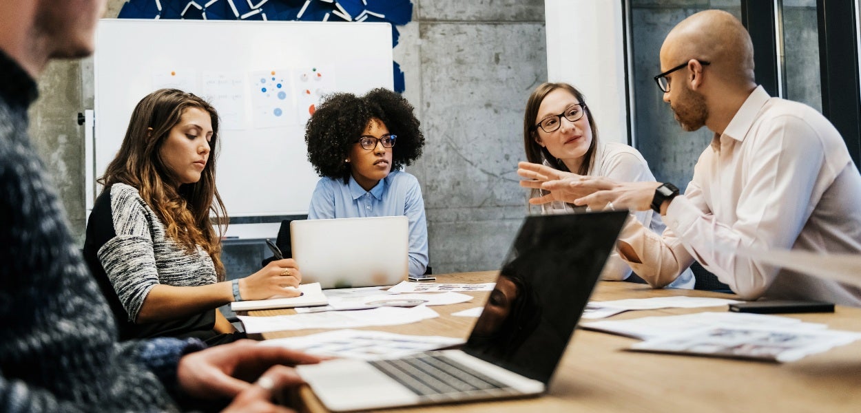 A group of people are holding a meeting.