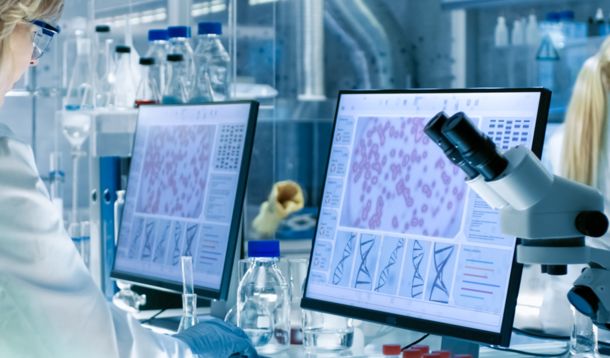 Woman behind screen in lab