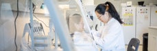 Woman conducts research in lab