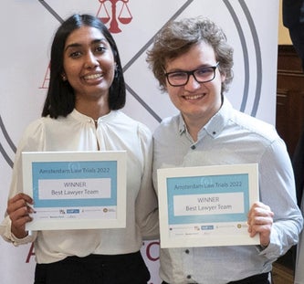 Students with award for Best Lawyer Team 