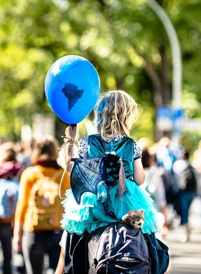 child with balloon