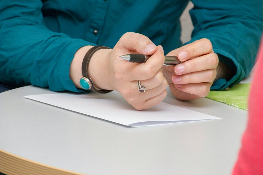 A woman taking notes