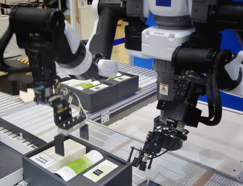 Robotic arms packaging products