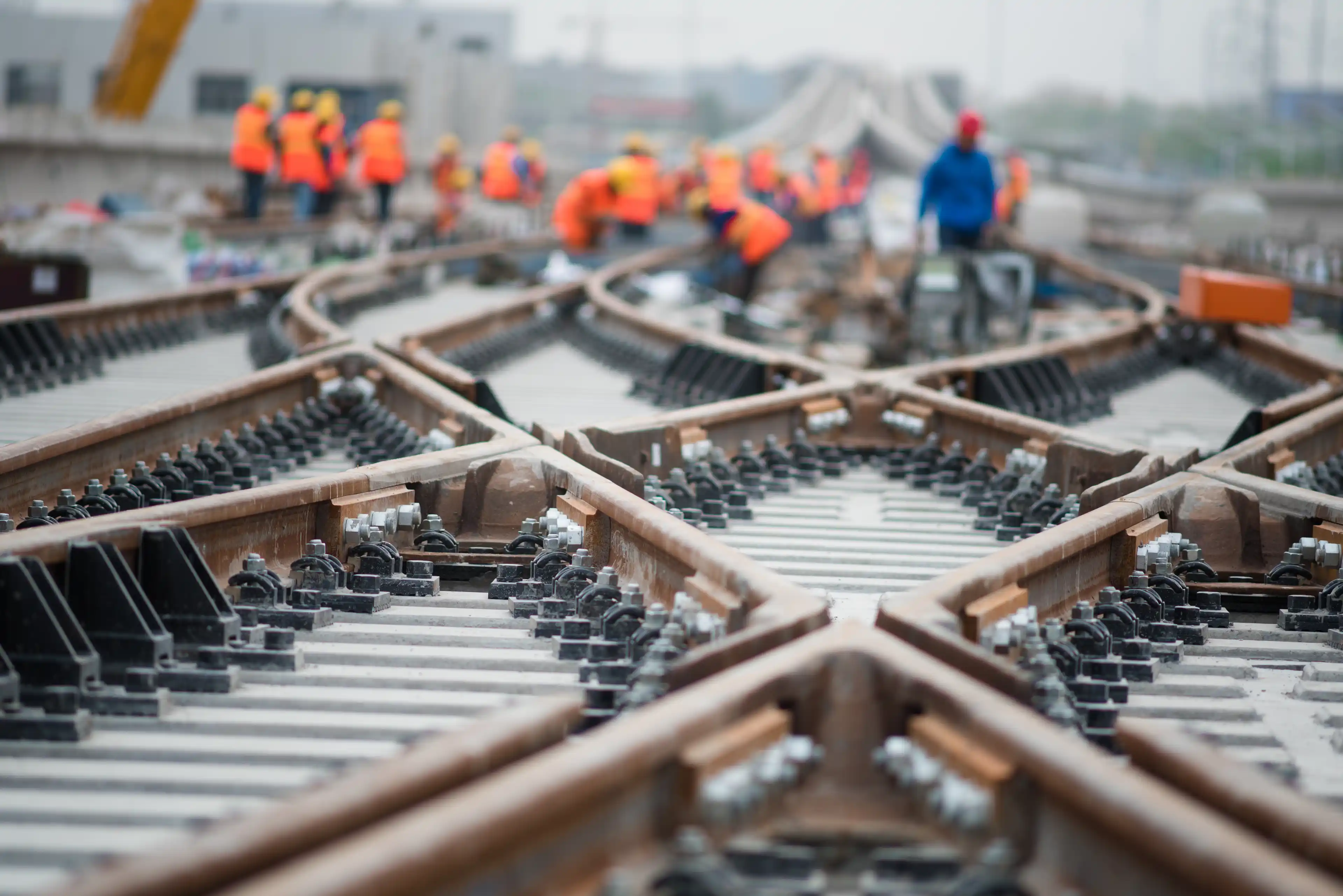 Rail workers working on the tracks together