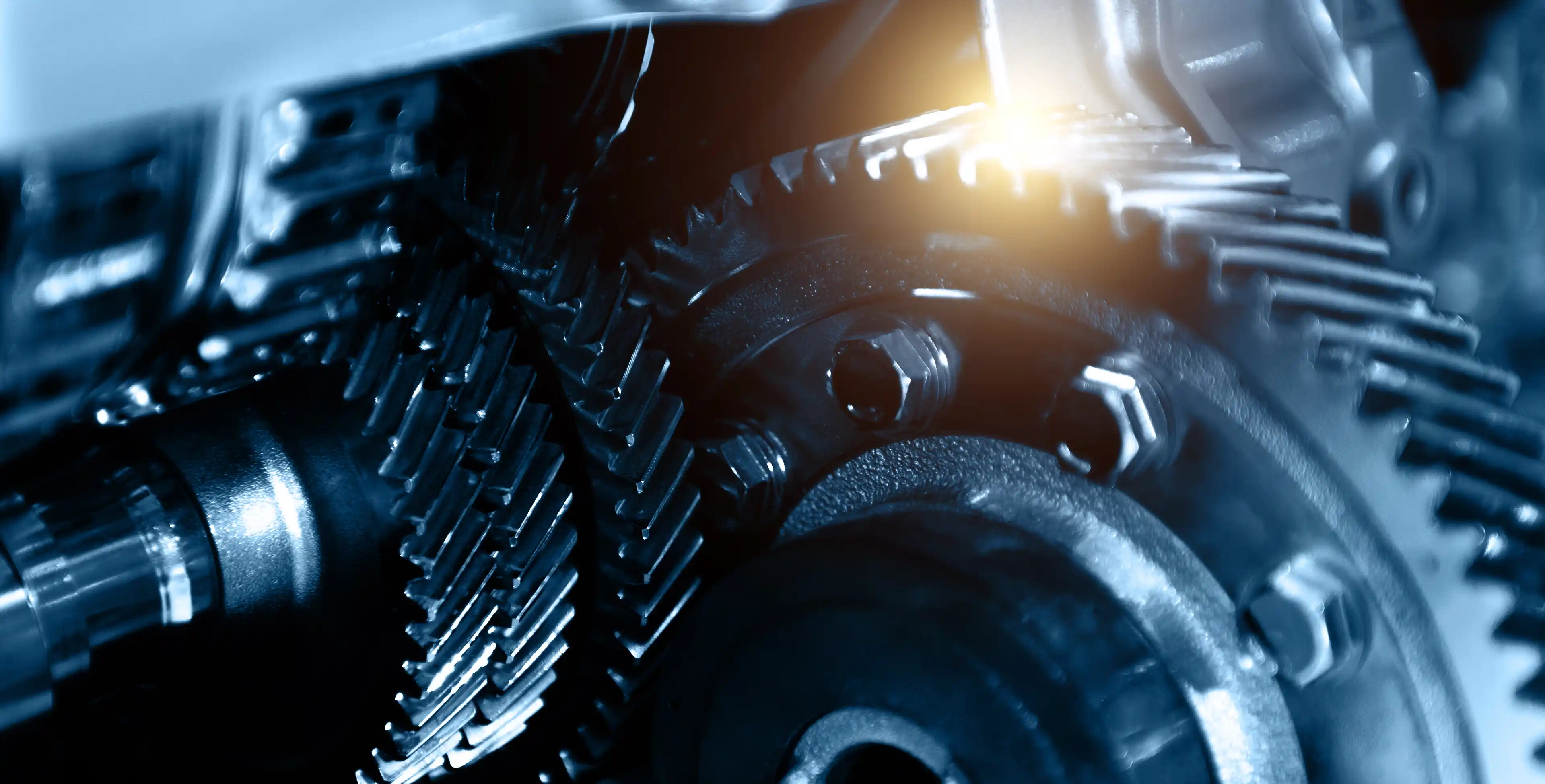 a close-up of gears turning within a machine