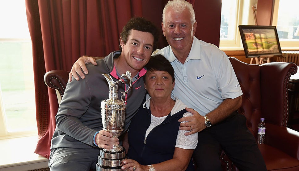 Rory McIlroy with his parents and the Claret Jug