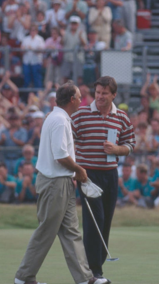 Nick Faldo congratulates Tom Lehman on winning The Open