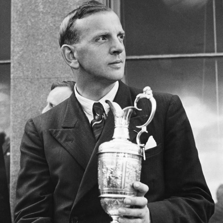 Dick Burton poses with the Claret Jug at St Andrews