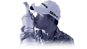Collin Morikawa kisses the Claret Jug after winning The 149th Open